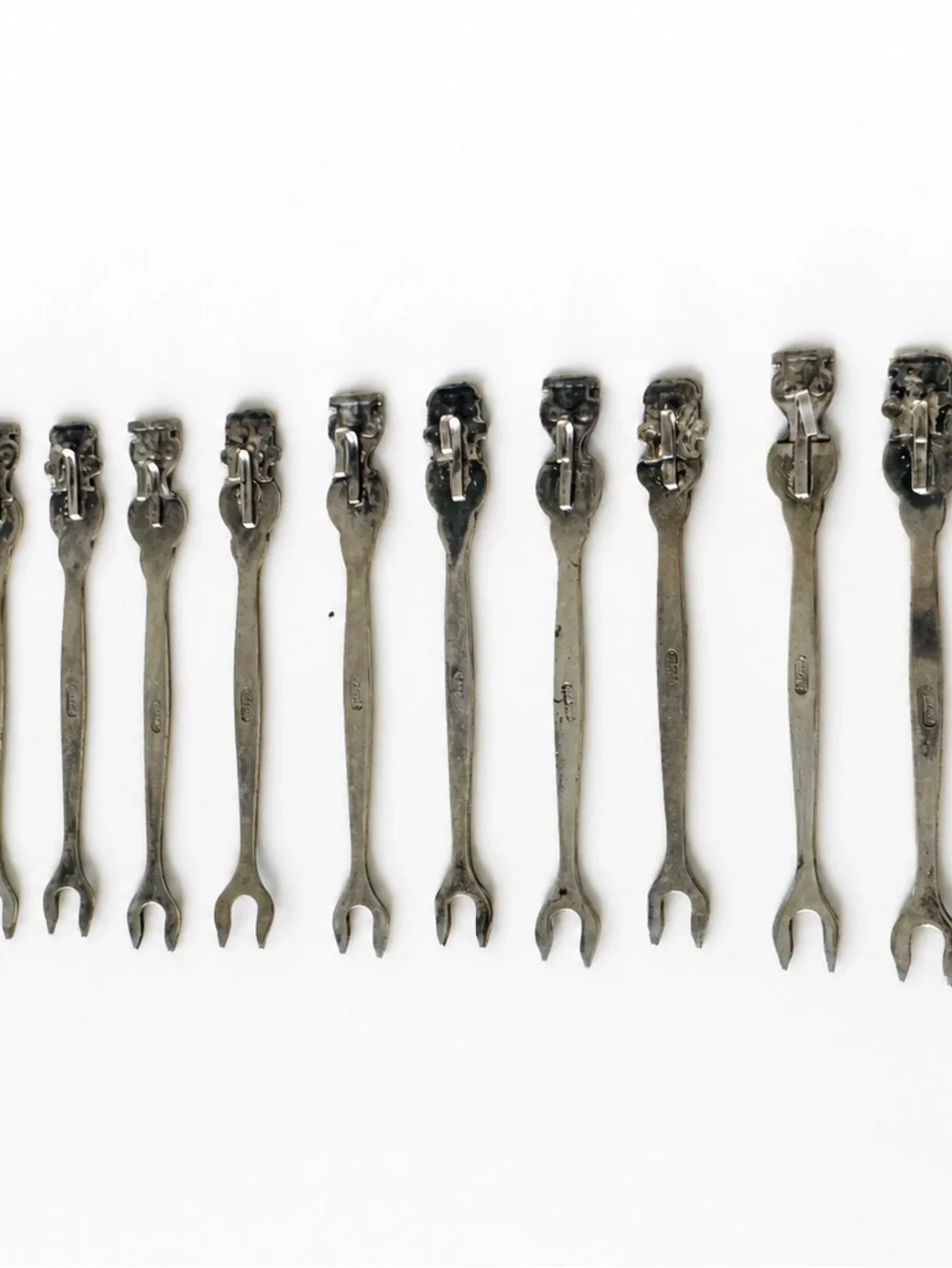 Mid-Century Alpaca Silver Cocktail Forks – Peruvian Inca Figural Set of 13